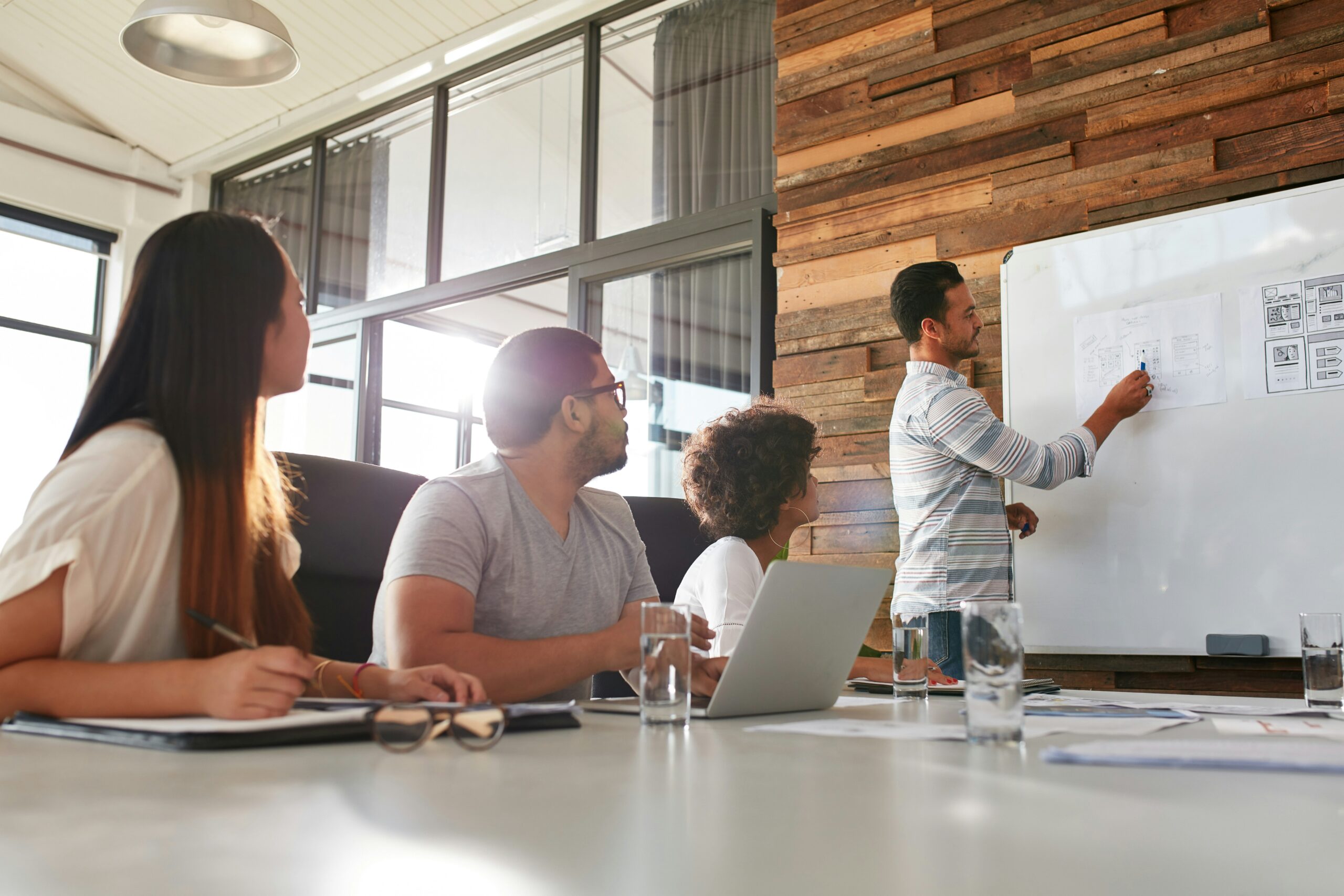 businessman-giving-training-presentation-to-his-colleagues